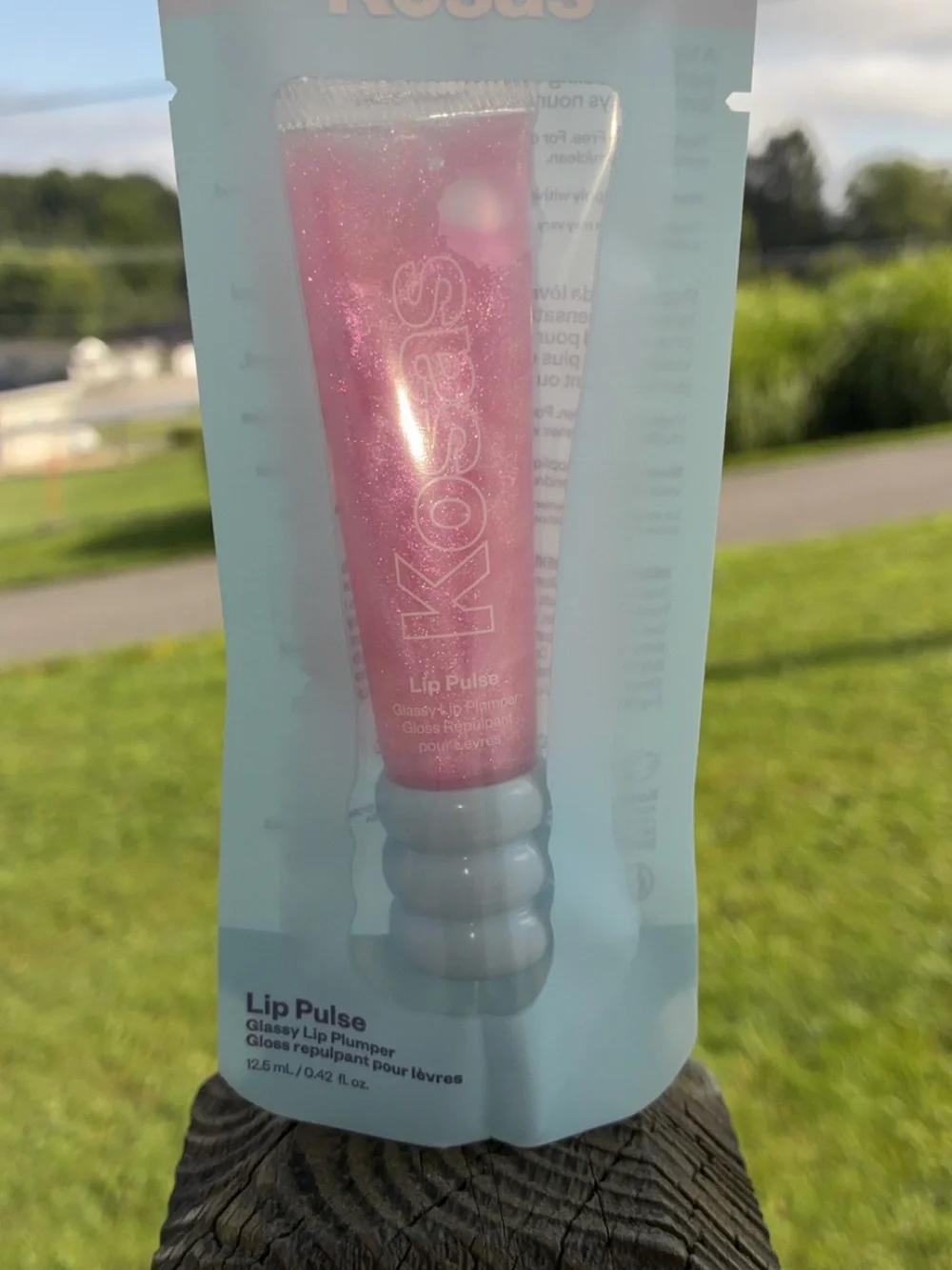 Kosas Lip Plumper Packaging in Pink and Teal